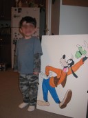 Kid posing with Goofy