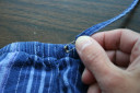 Use safety pin to replace drawstring
