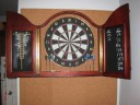 cork behind dart board