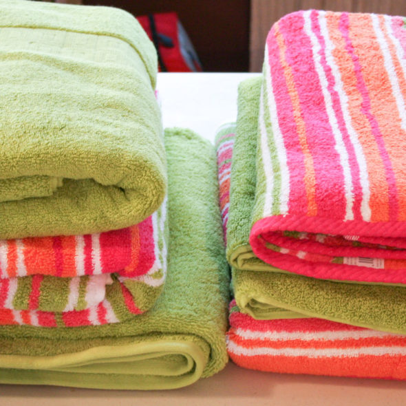 Make an extra large beach blanket from towels