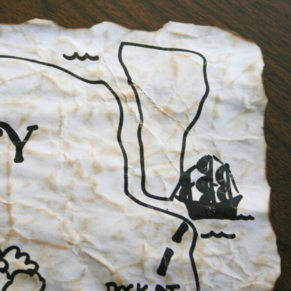 make a pirate map party invitation - closeup of ink effect
