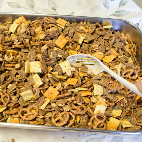 bold and spicy chex mix recipe - stir carefully to coat