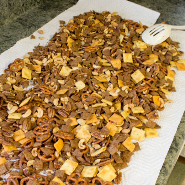 bold and spicy chex mix recipe - cool on paper towels
