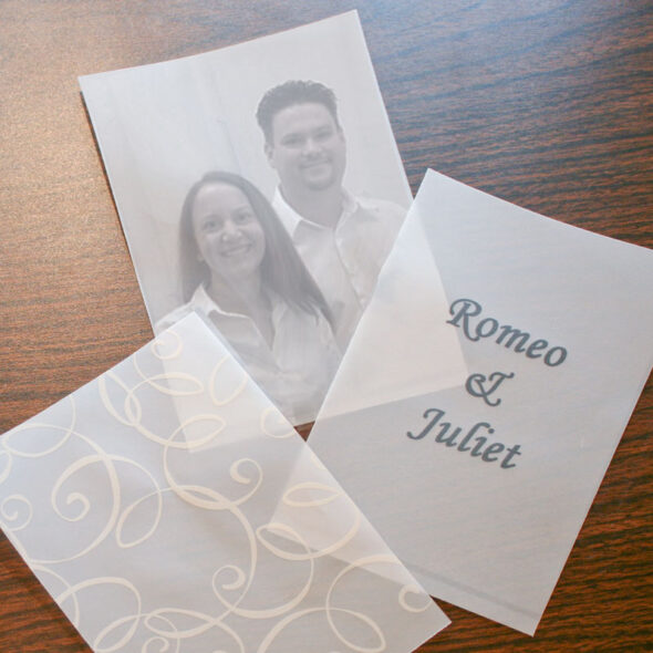 DIY wedding luminaria centerpieces from dollar store frames and printed vellum