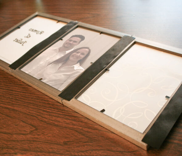 DIY wedding luminaria centerpieces from dollar store frames and printed vellum