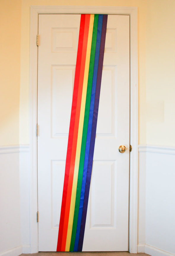 St. Patrick's Day door decoration with rainbow and pot of gold