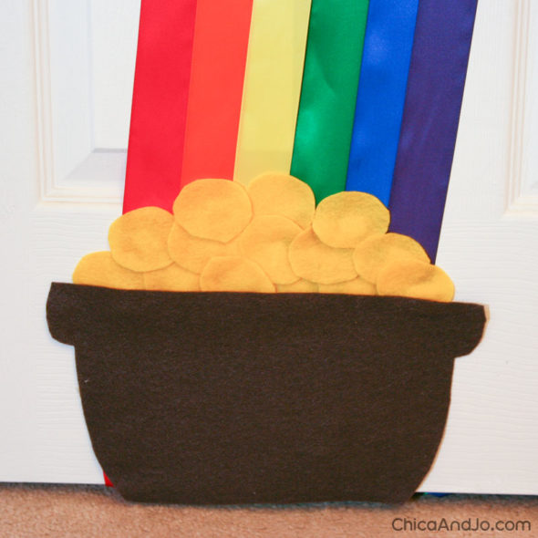 St. Patrick's Day door decoration with rainbow and pot of gold