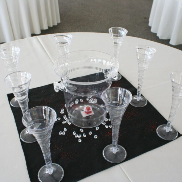 Champagne wedding centerpiece with lights and roses
