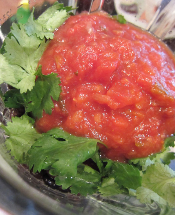 Halloween black bean dip with ghost-shaped tortillas