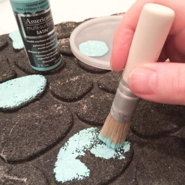 Use paint to revive a worn out door mat