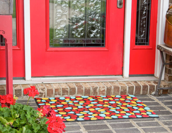 Use paint to revive a worn out door mat