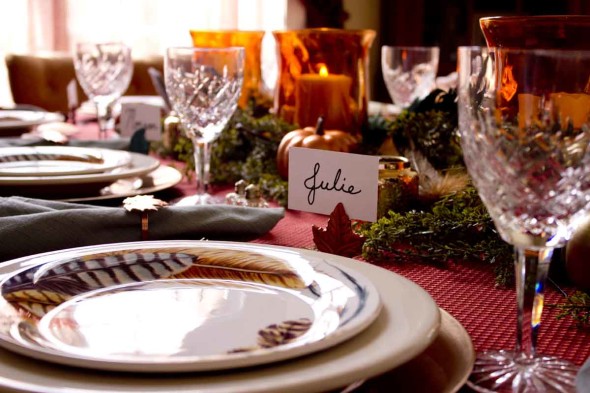 Feathers and metallics for a Thanksgiving table setting