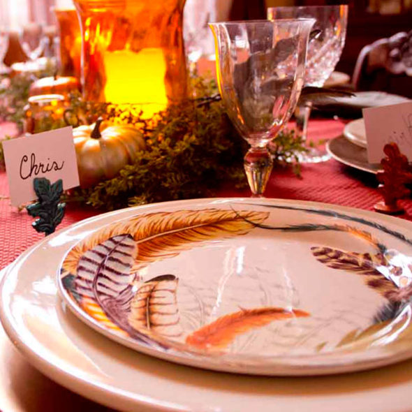 Feathers and metallics for a Thanksgiving table setting