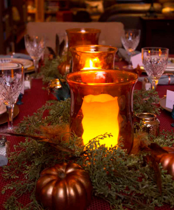 Feathers and metallics for a Thanksgiving table setting