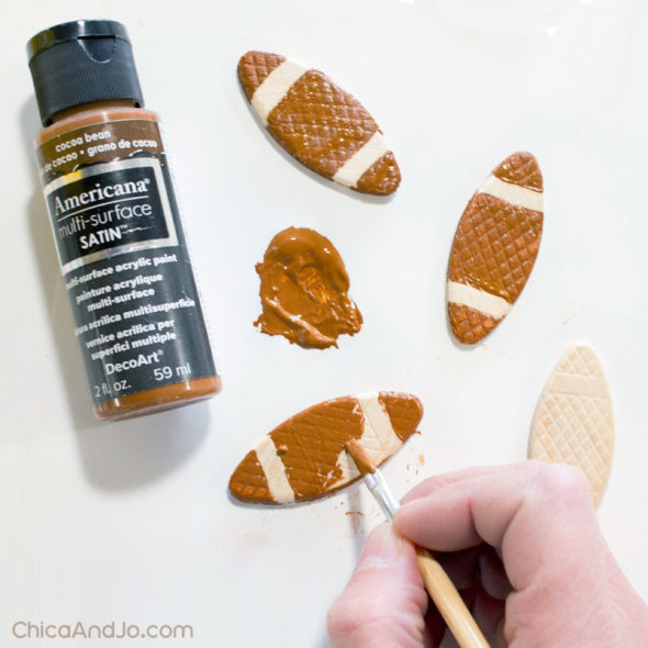 Mini football garland made from wood biscuits