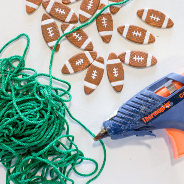 Mini football garland made from wood biscuits