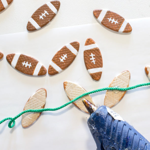 Mini football garland made from wood biscuits