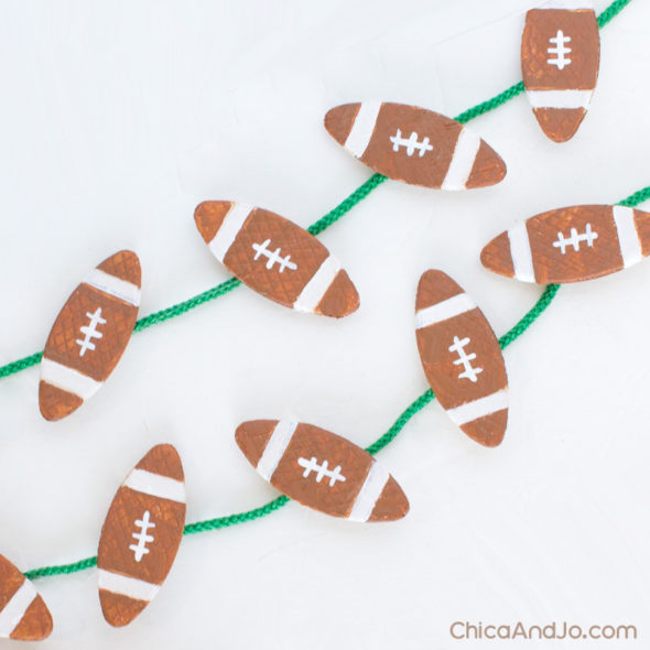 Mini football garland made from wood biscuits