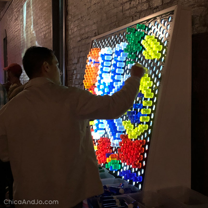 Your inner child will love this giant Lite-Brite wall