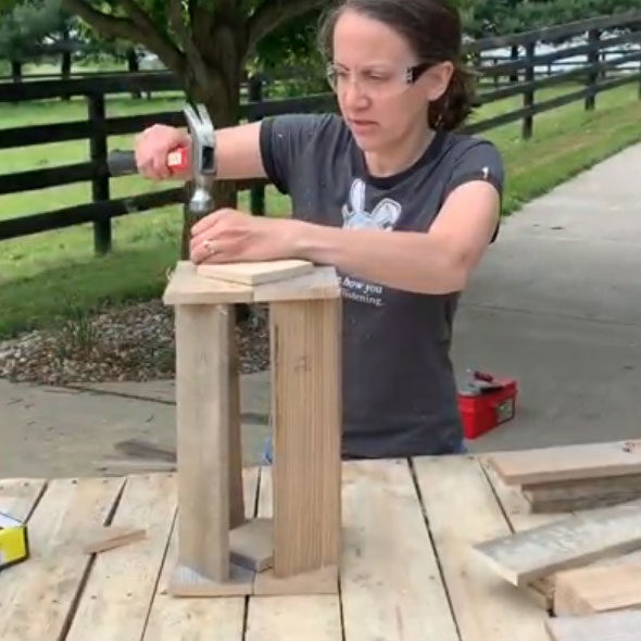 Upcycle pallets into outdoor candle lanterns