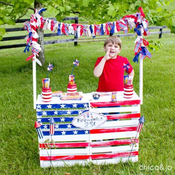 Kid fireworks roadside stand from crates