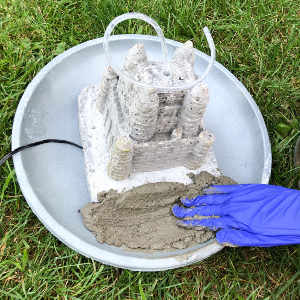 Cast concrete sandcastle fountain bird bath