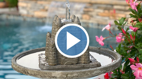 Cast concrete sandcastle fountain bird bath