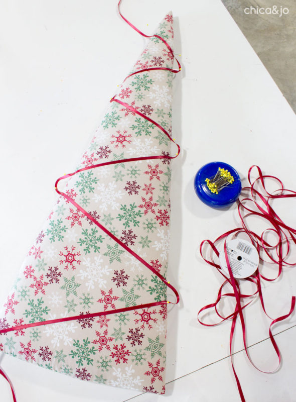 Upholstered fabric Christmas trees with tufting