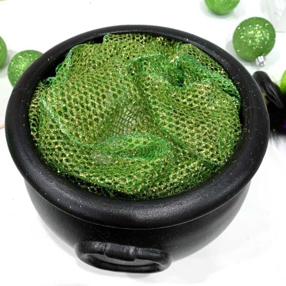 Witch cauldron centerpiece for a Halloween party