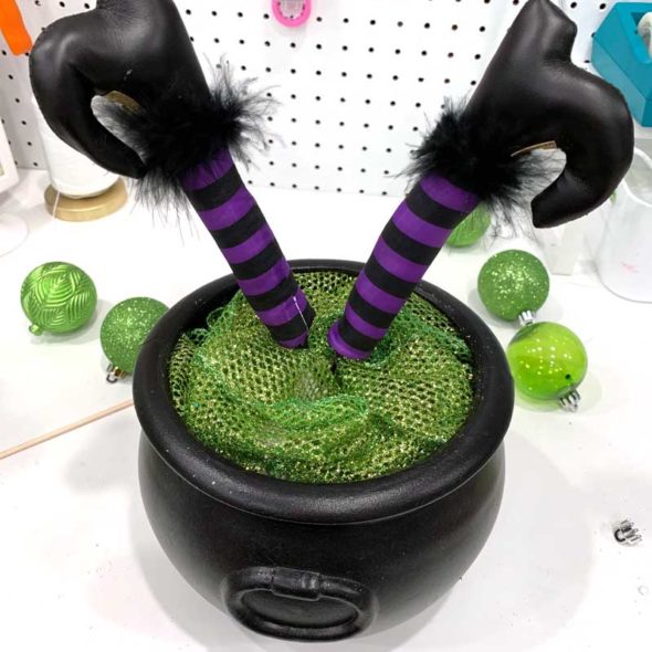 Witch cauldron centerpiece for a Halloween party