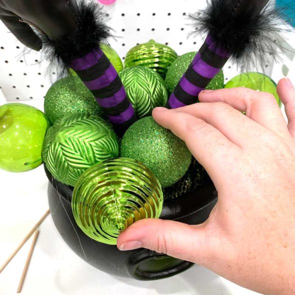 Witch cauldron centerpiece for a Halloween party