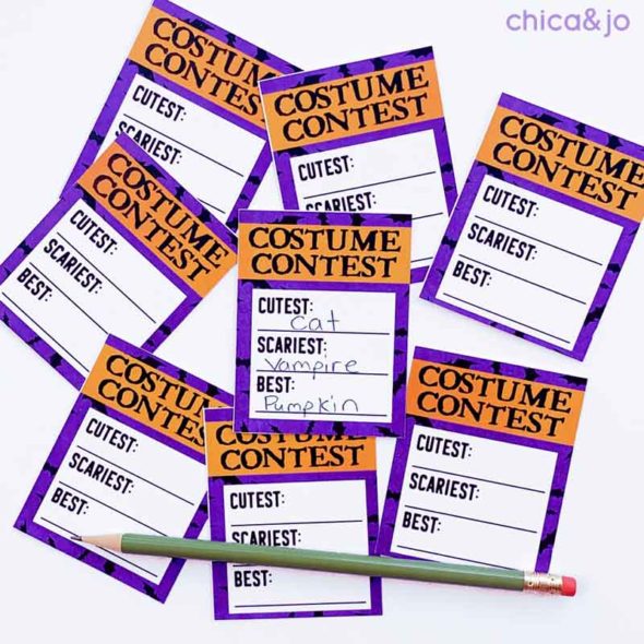 Halloween costume party prize ribbons and voting slips