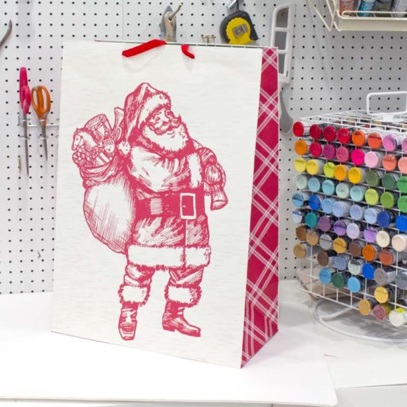 Upcycle Christmas gift bags into art