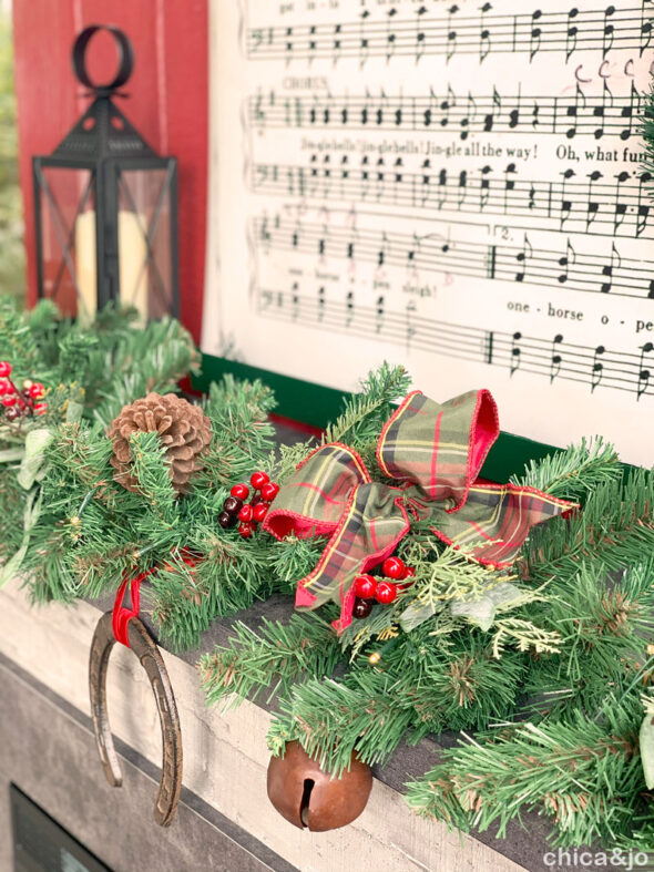 Equestrian themed Christmas decor with outdoor fireplace