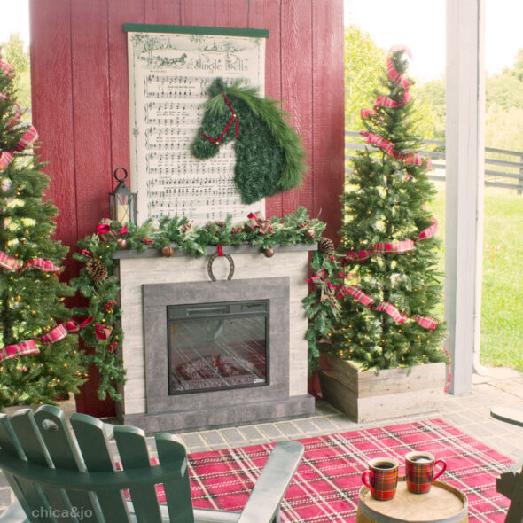 Equestrian themed Christmas decor with outdoor fireplace