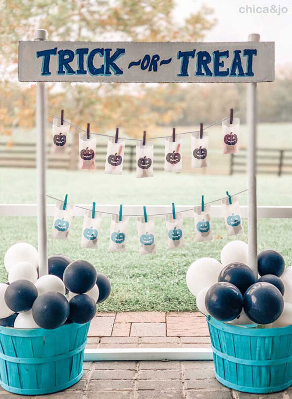 Self-serve Halloween trick-or-treat candy station with Teal Pumpkin Project favors