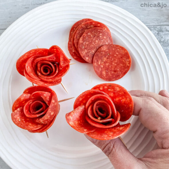 Valentine's Day charcuterie board in a heart-shaped candy box