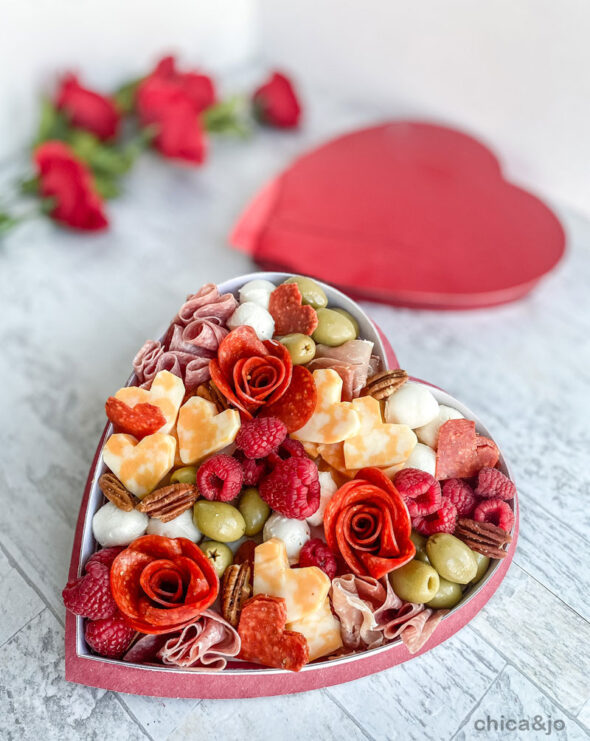 Valentine's Day charcuterie board in a heart-shaped candy box