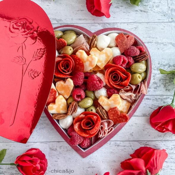 Valentine's Day charcuterie board in a heart-shaped candy box