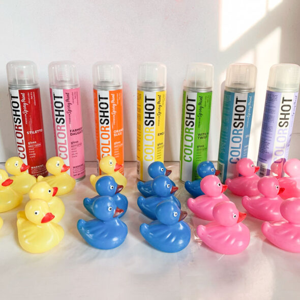 Rainbow kid's bathroom art from painted toy ducks