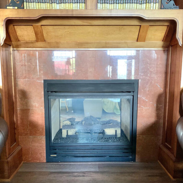 Update fireplace surround tile with vinyl