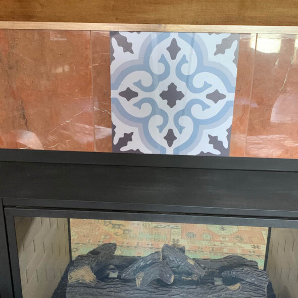 Update fireplace surround tile with vinyl