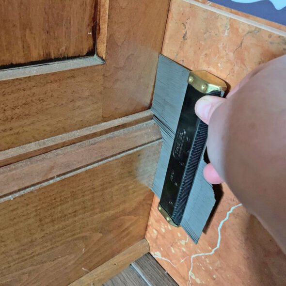 Update fireplace surround tile with vinyl