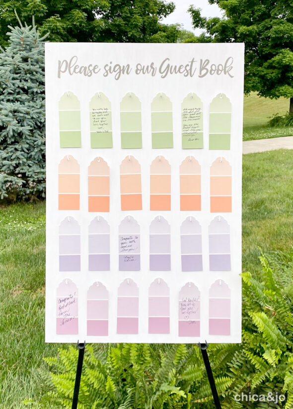 Alternative wedding guest book board with paint chip tags