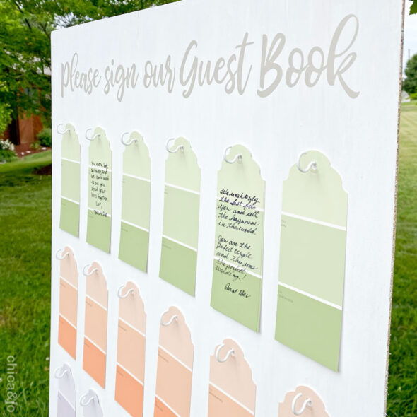 Alternative wedding guest book board with paint chip tags
