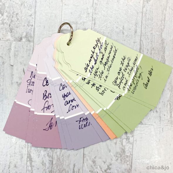 Alternative wedding guest book board with paint chip tags