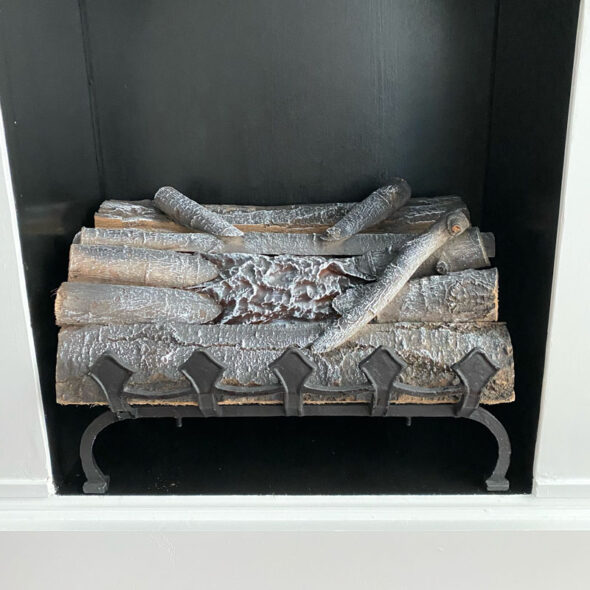 DIY faux fireplace made from an upcycled hutch