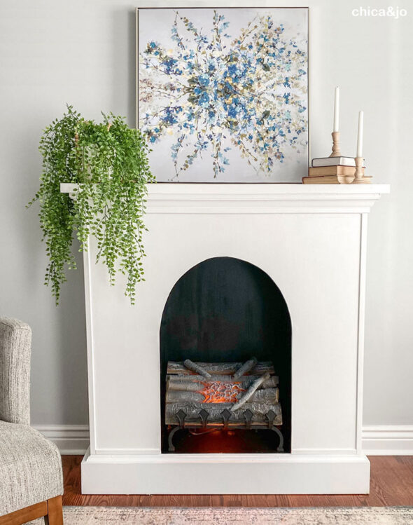 DIY faux fireplace made from an upcycled hutch