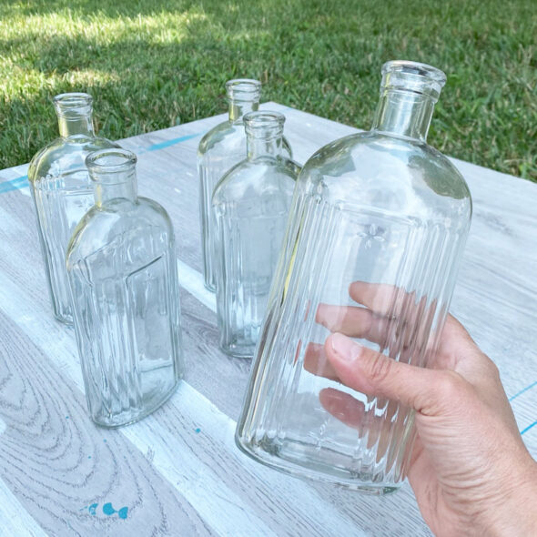 Spray painted glass bottles for a faux ceramic look