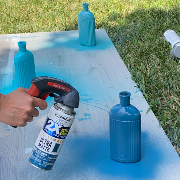 Spray painted glass bottles for a faux ceramic look